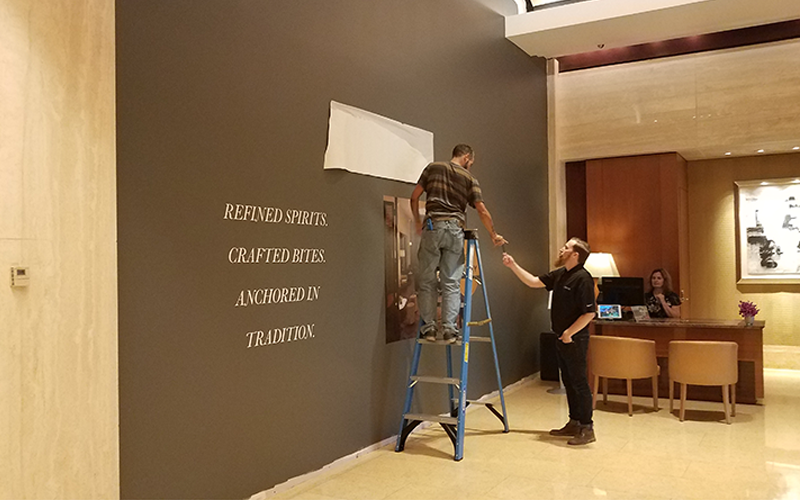 Sign Installation at Avery bar Ritz Carlton